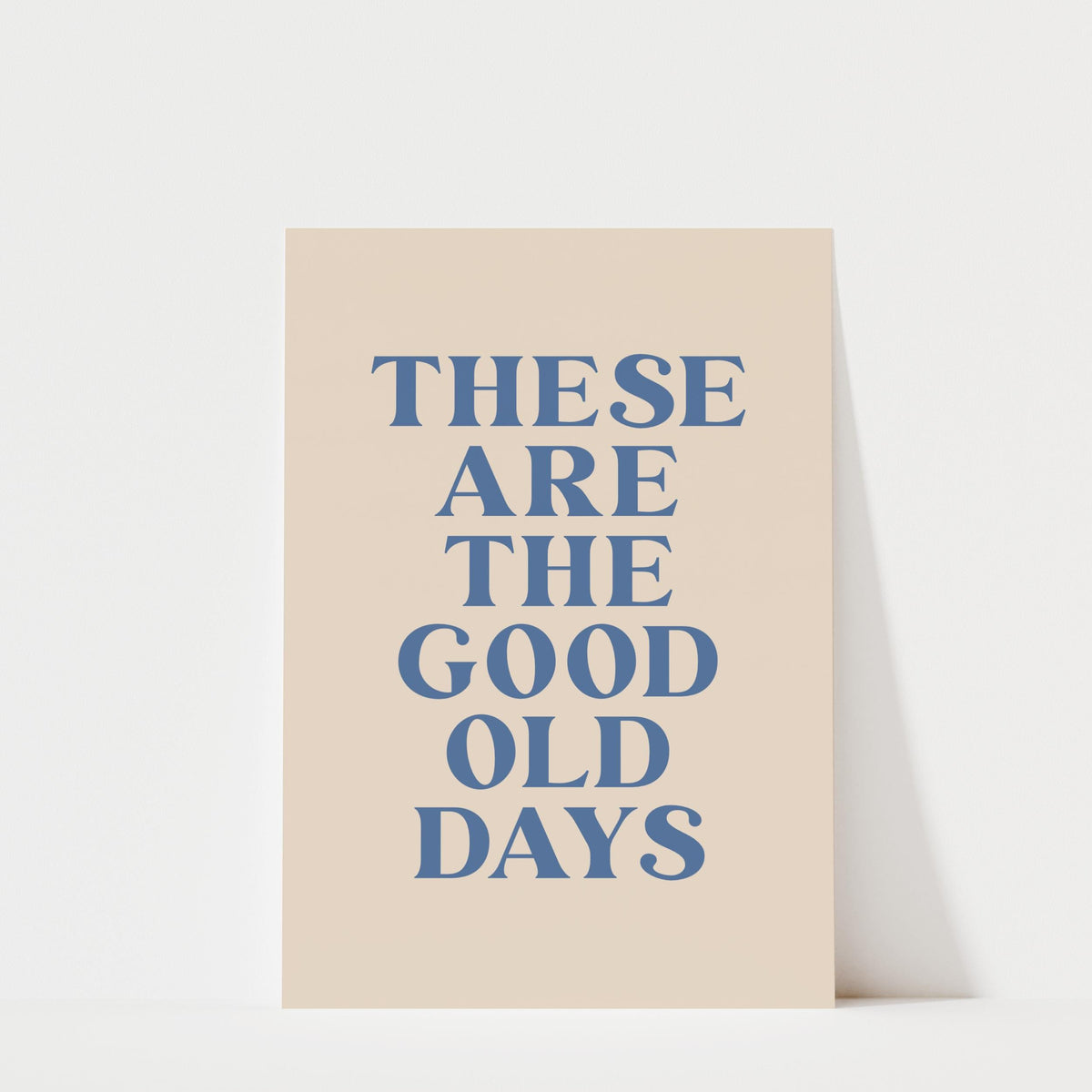 a poster with the text "THESE ARE THE GOOD OLD DAYS" in a large, bold font.
