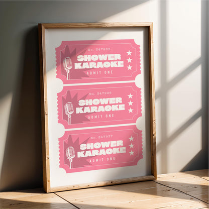 A framed poster advertising shower karaoke events, with three tickets displayed in a pink color.