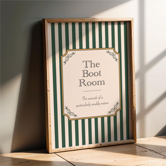 a framed sign with a green and white striped background and decorative elements, indicating that it is a sign for "The Boot Room".