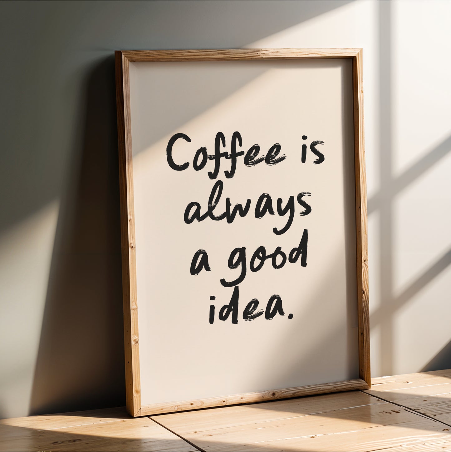 a framed poster with the text "Coffee is always a good idea."