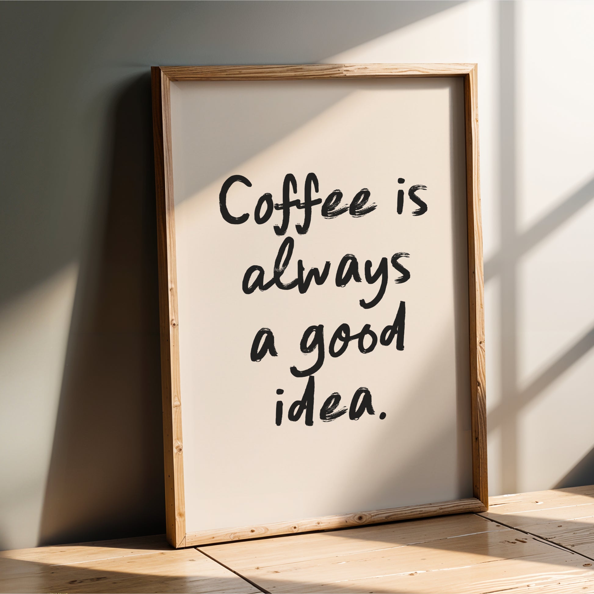 a framed poster with the text "Coffee is always a good idea."