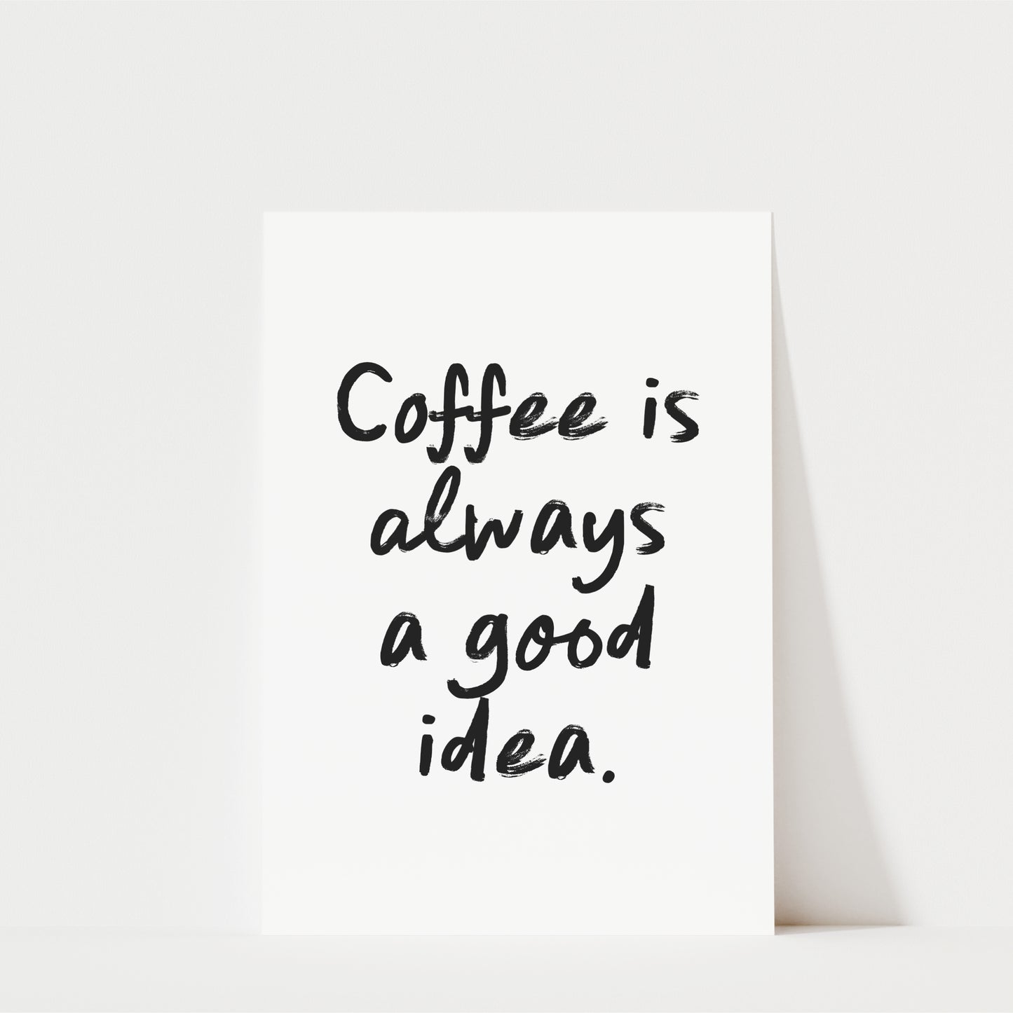 a simple, handwritten text that reads "Coffee is always a good idea."