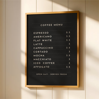 a black and white coffee menu board hanging on a wall.