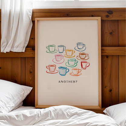 a framed poster with a colorful illustration of various coffee cups and saucers, along with the text "Another?"