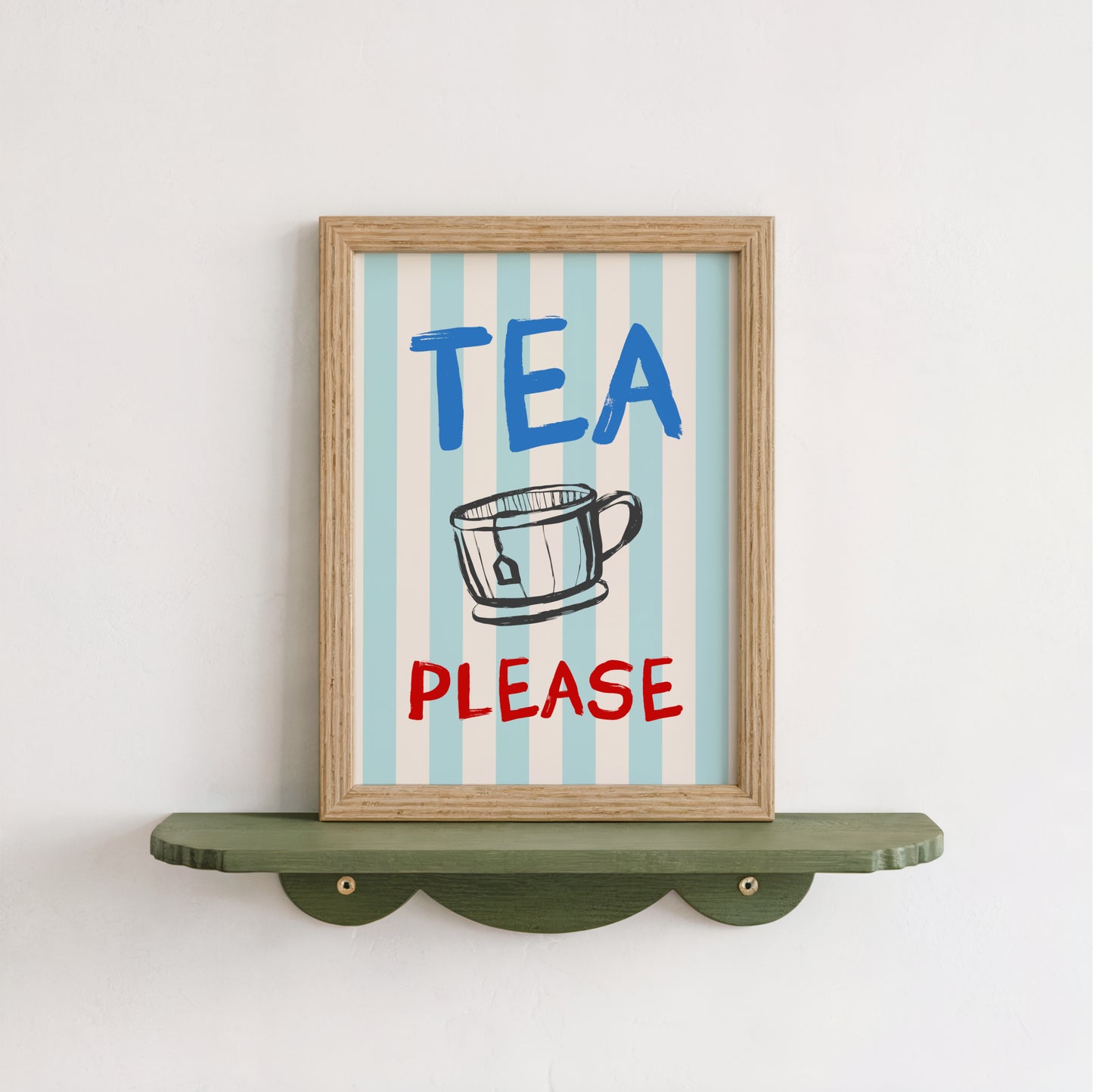 A framed sign with the text "TEA PLEASE" and an illustration of a cup, mounted on a shelf against a white wall.