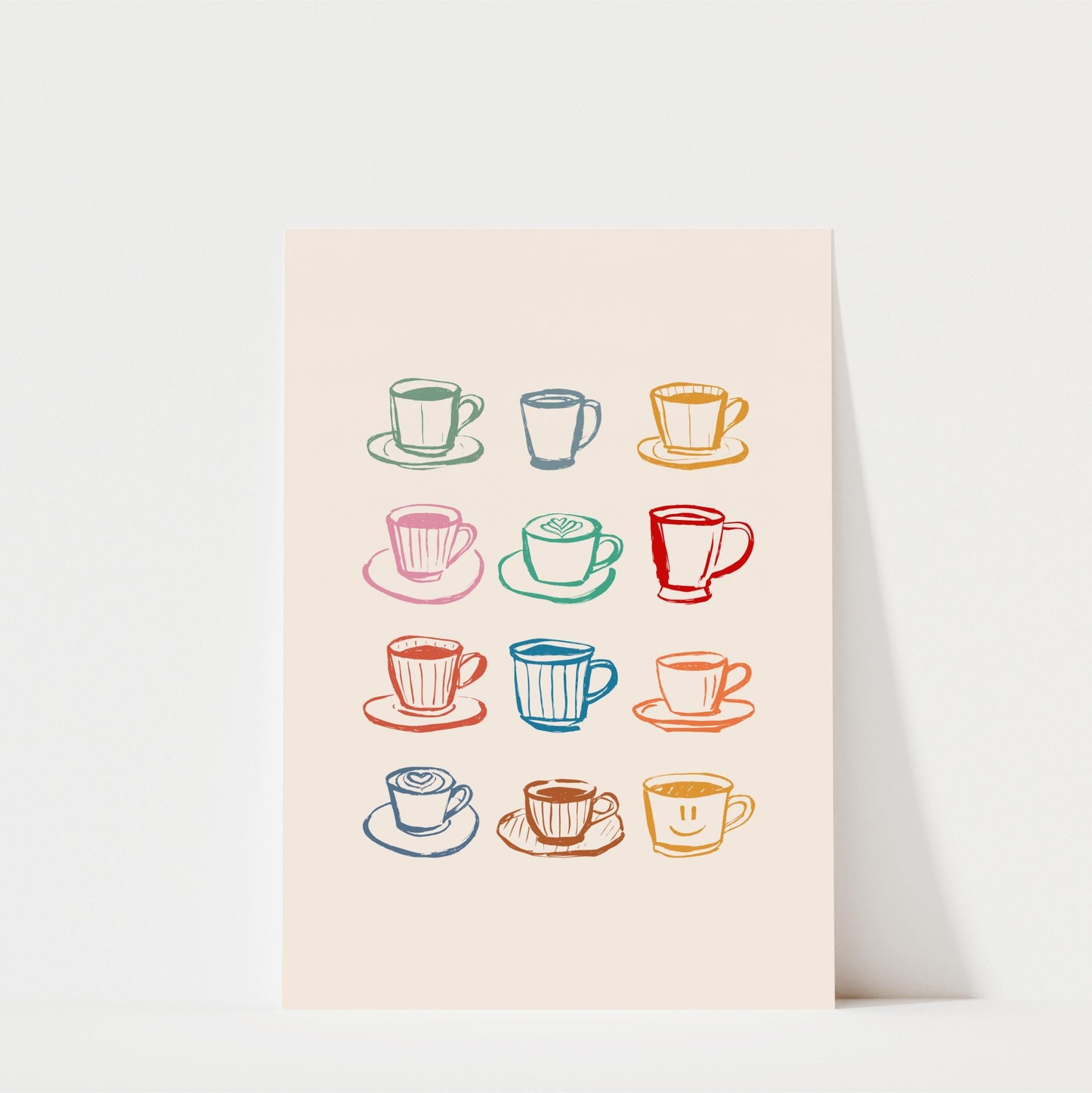 A collection of twelve colorful coffee cups and saucers arranged in a grid pattern on a light background.