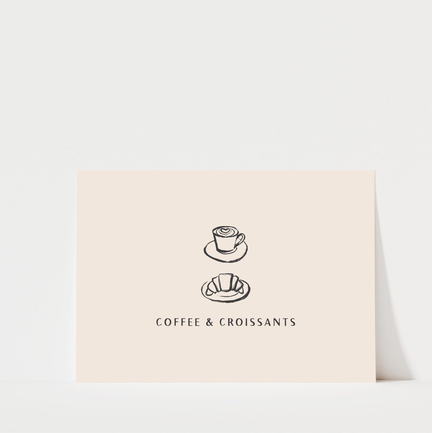 A simple illustration of a coffee cup and croissant on a light-colored background, accompanied by the text "COFFEE & CROISSANTS".