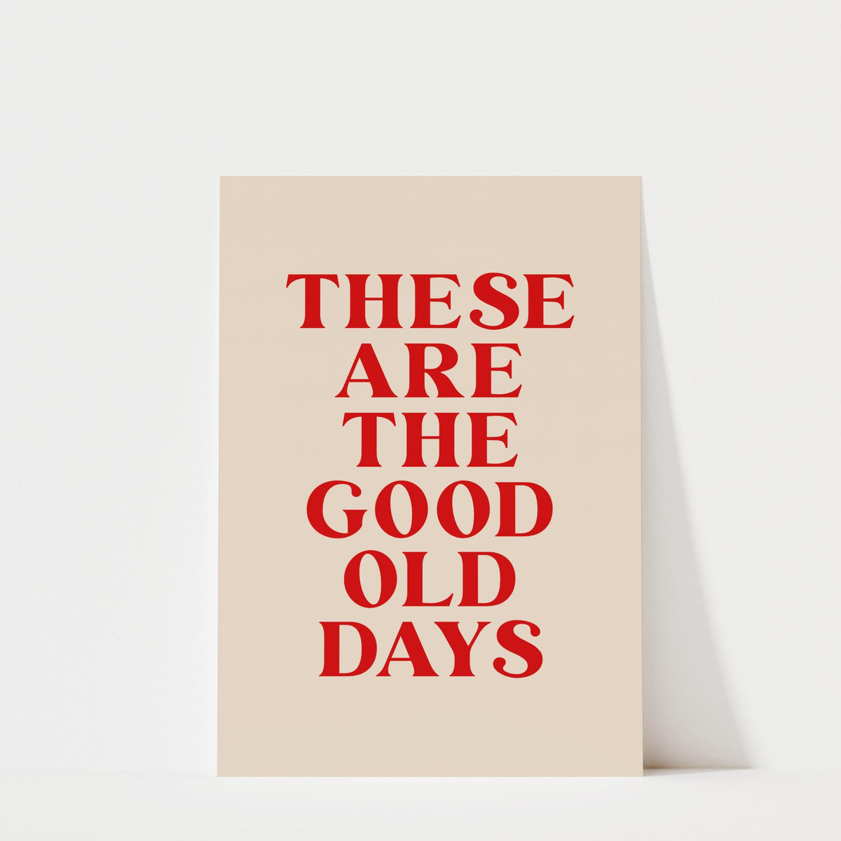 a poster with the text "These are the good old days" in bold red letters.