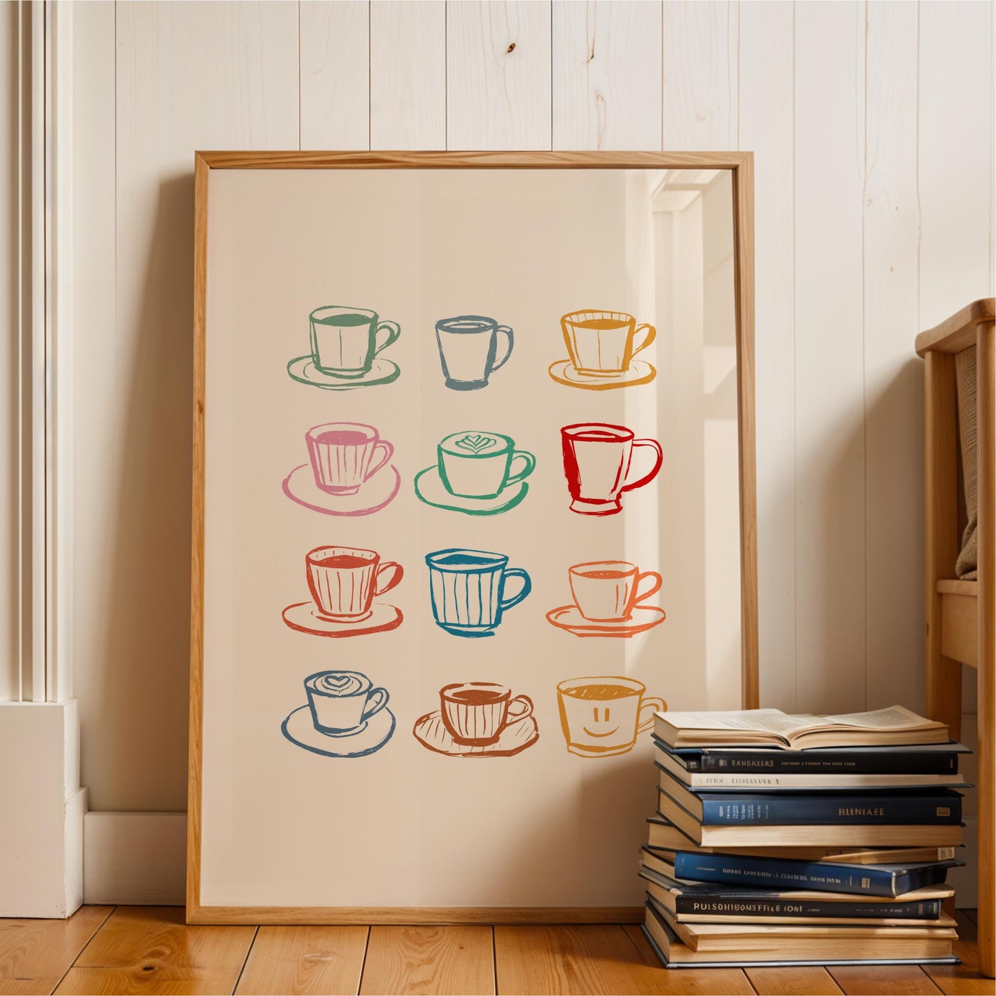 A framed print featuring a collection of colorful coffee cups and saucers, arranged in a grid pattern on a wooden floor.
