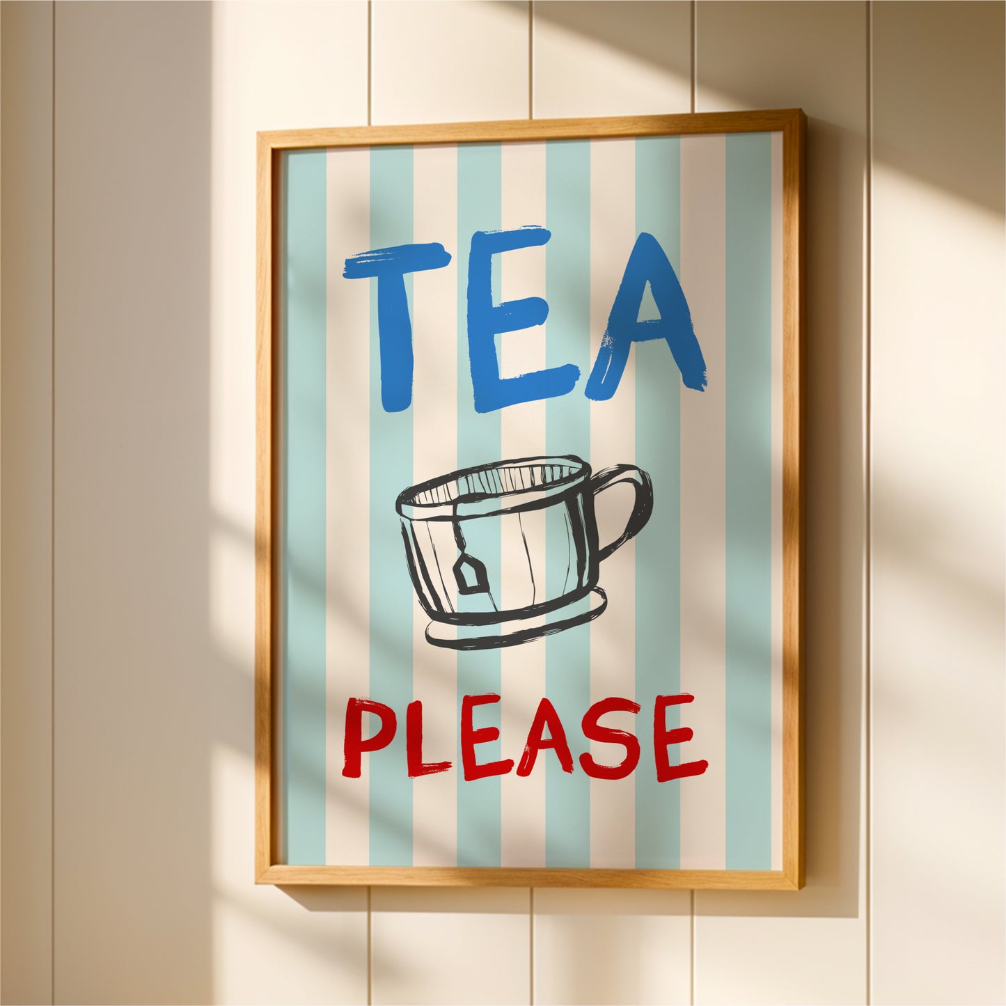 A framed poster with the text "TEA PLEASE" and an illustration of a cup or mug.