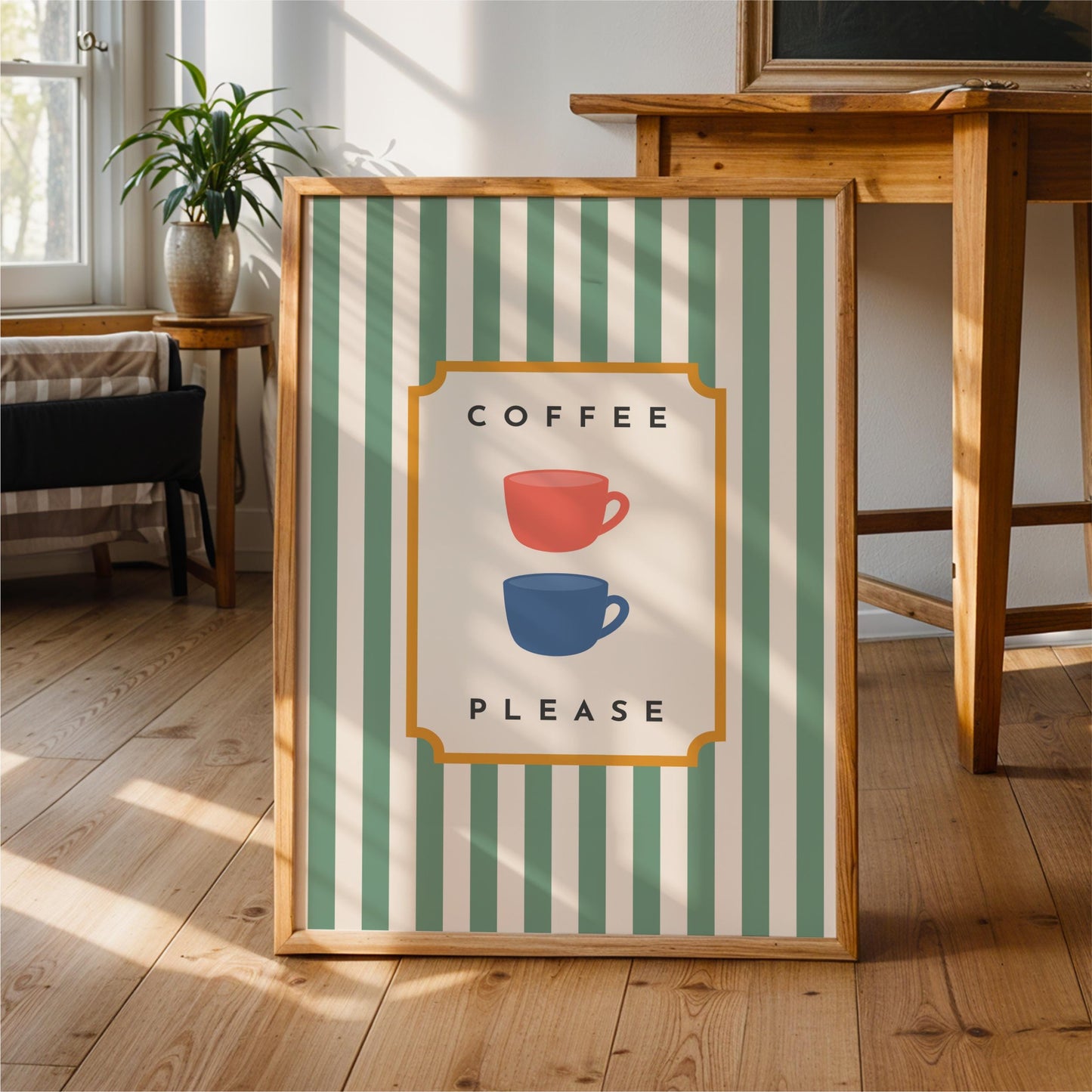 a framed poster with a green and white striped background, a yellow border, and two coffee cups - one red and one blue. The text on the poster says "COFFEE PLEASE".