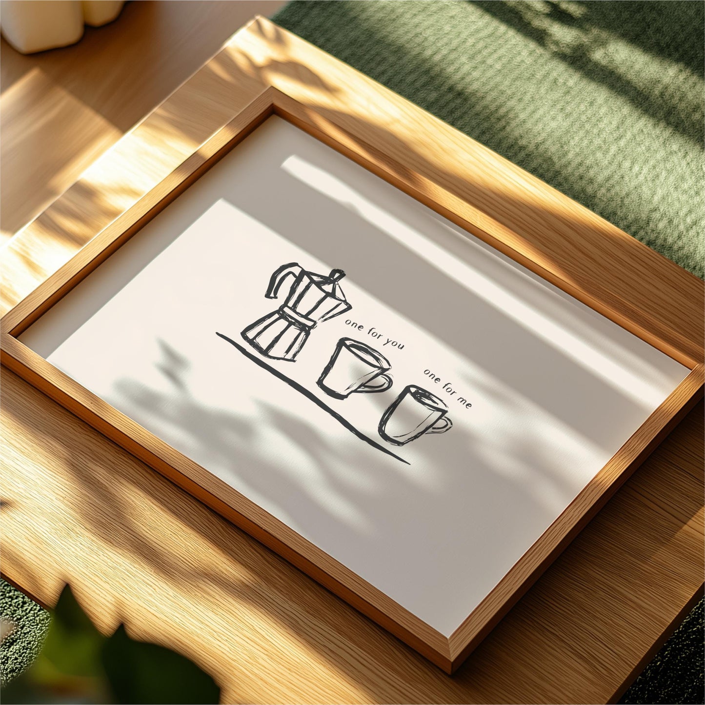 a framed drawing of a coffee maker and two coffee cups, accompanied by the text "one for me".