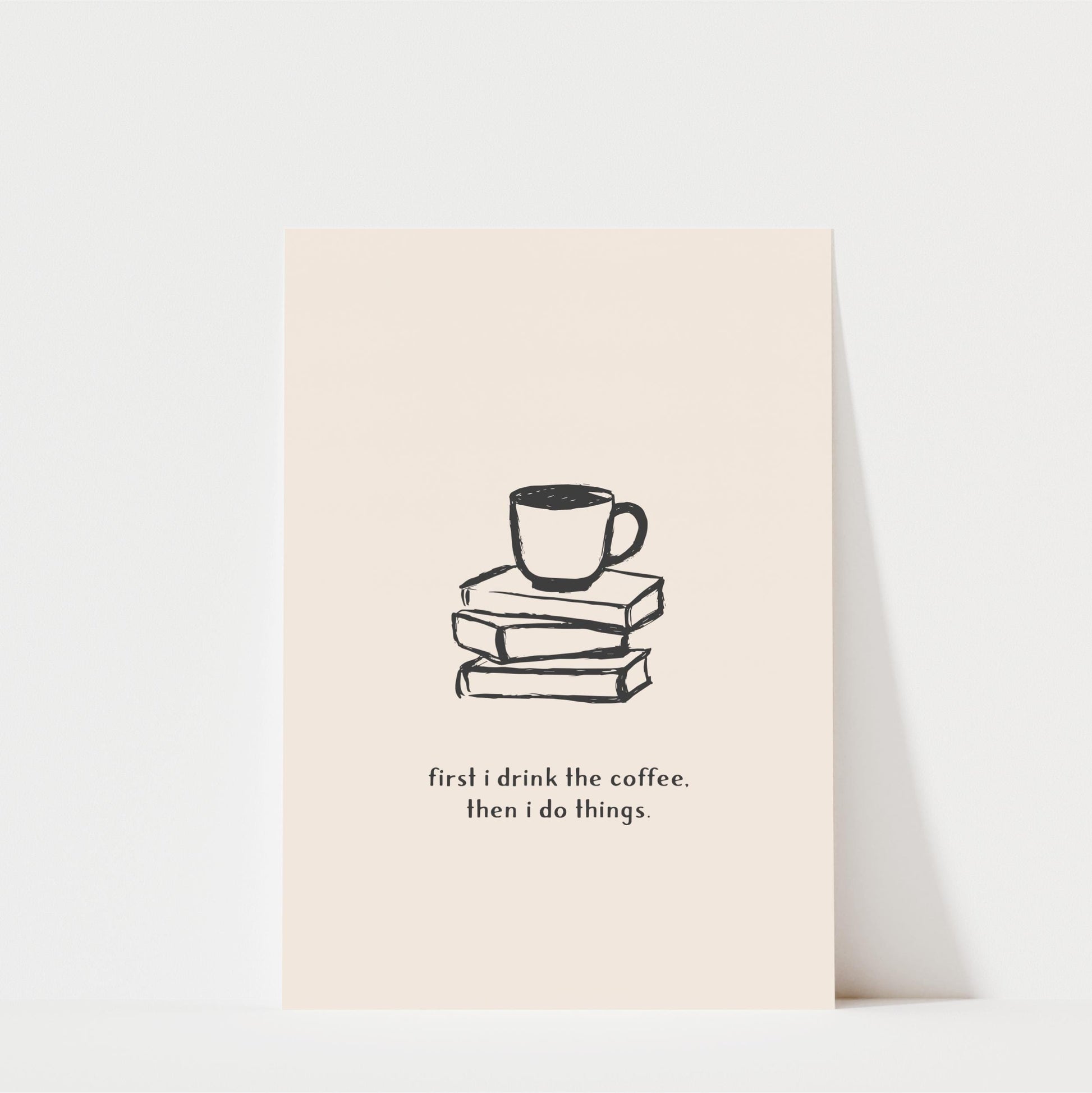 A simple black and white illustration of a cup of coffee on top of a stack of books, accompanied by the text "first I drink the coffee. Then I do things."