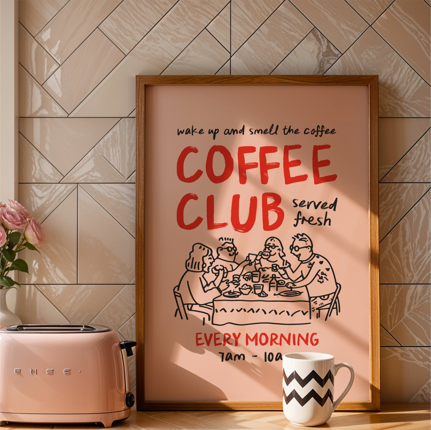 a framed poster advertising a coffee club, with a toaster and a coffee mug placed next to it on a kitchen counter.