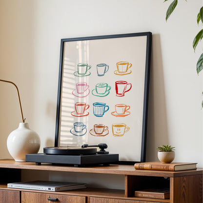 a framed poster of colorful coffee cups on a wall, with a record player and other decor items on a wooden shelf below.