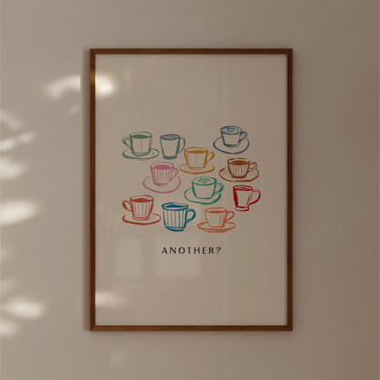 The image is a framed poster with a collage of colorful coffee cups and saucers arranged in a grid-like pattern.
