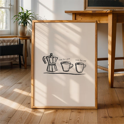 a framed artwork depicting a coffee maker and two coffee cups, accompanied by the text "one for me".