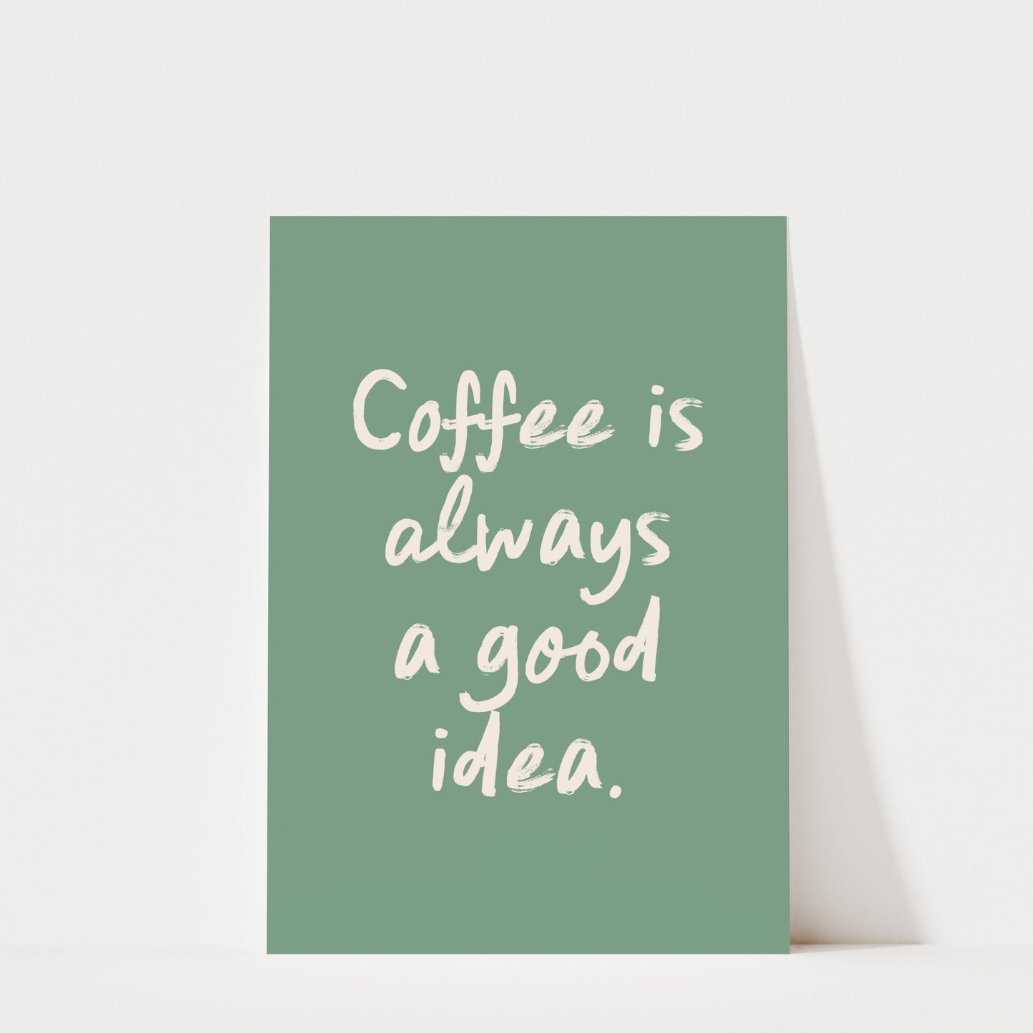 a green poster with the text "Coffee is always a good idea."