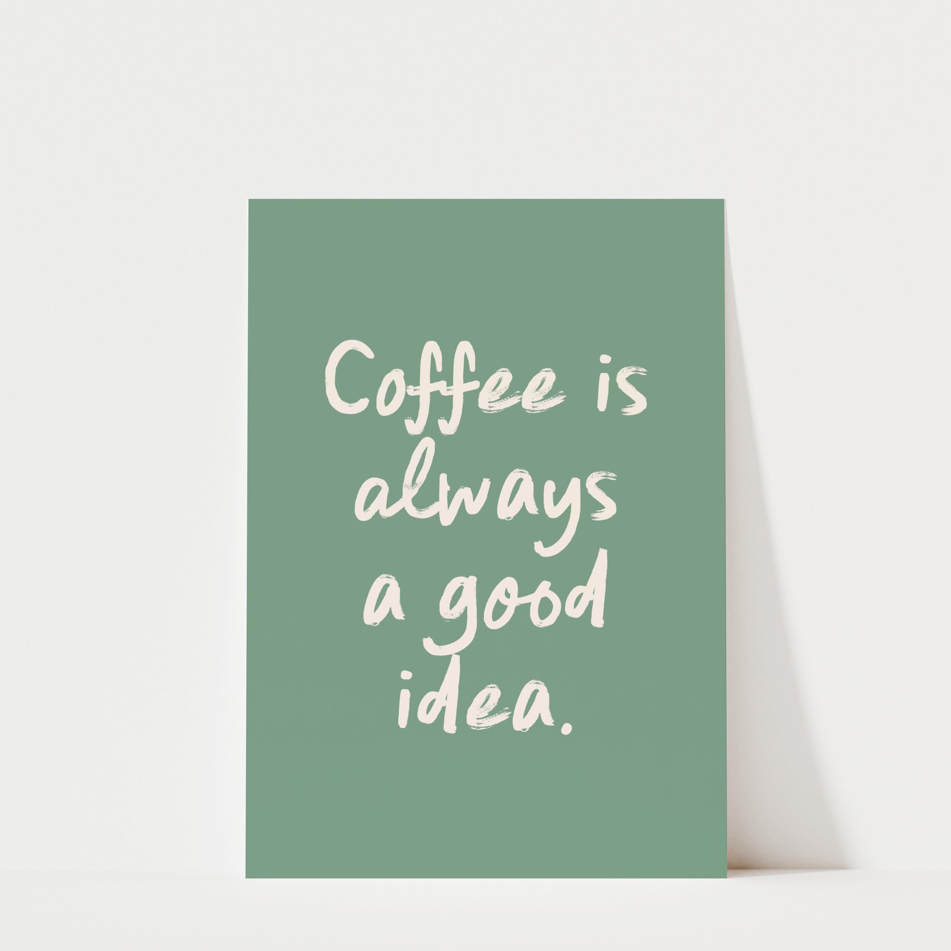 a green poster with the text "Coffee is always a good idea."