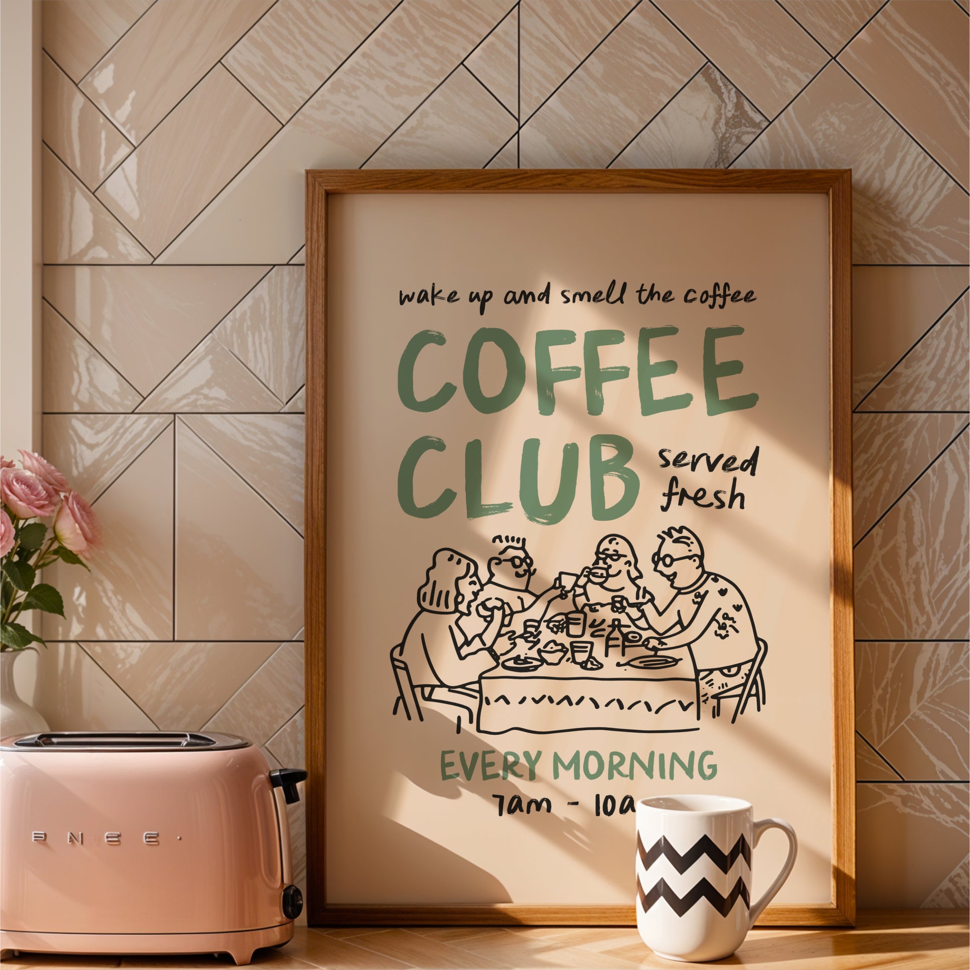 a framed poster advertising a coffee club, with a toaster and a coffee mug placed next to it on a kitchen counter.