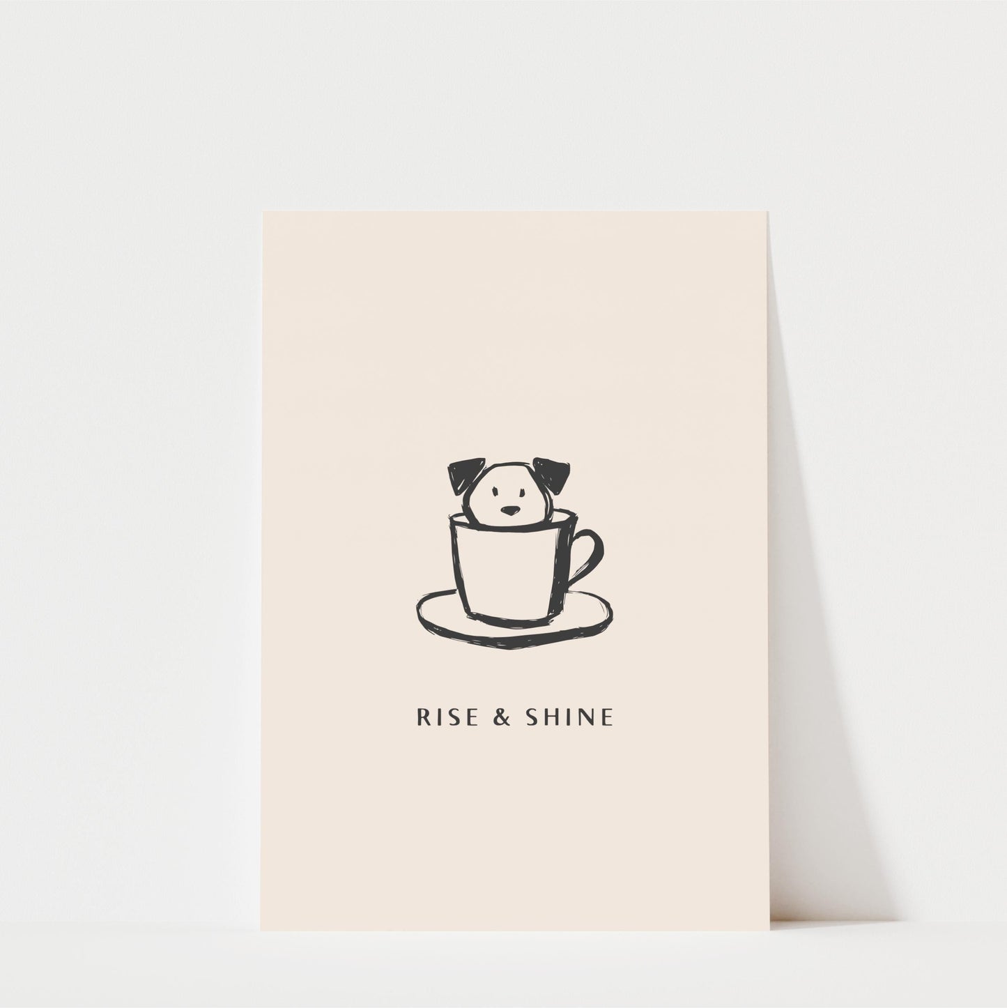 A simple illustration of a dog sitting inside a cup, accompanied by the text "RISE & SHINE" below it.