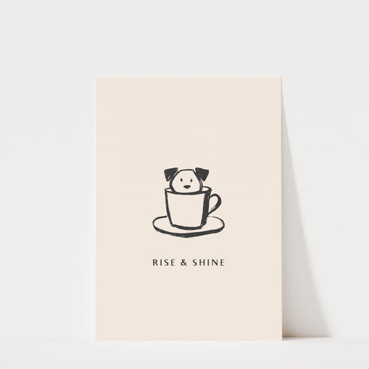 A simple illustration of a dog sitting inside a cup, accompanied by the text "RISE & SHINE" below it.