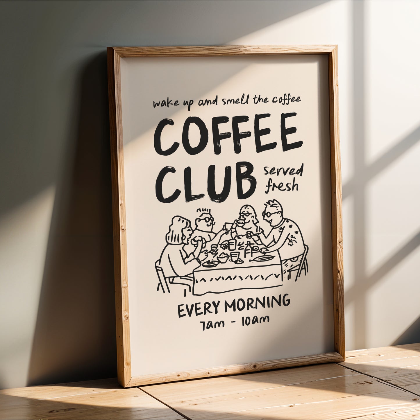The image is a framed poster advertising a coffee club. It features a cartoon illustration of people enjoying coffee together, with text that reads "wake up and smell the coffee" and "coffee club served fresh every morning from 8am - 10am".