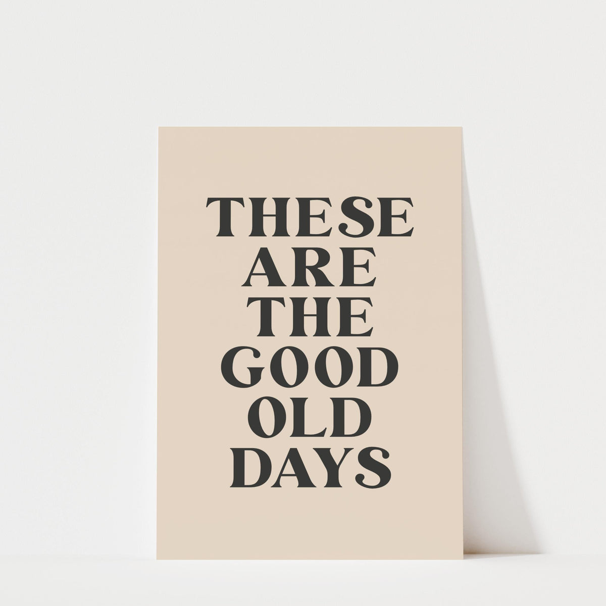 a poster with the text "These are the good old days" in a bold, black font.
