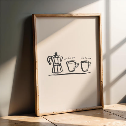 a framed poster with a simple black and white illustration of a coffee maker and two cups, accompanied by the text "one for you one for me".
